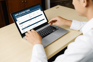 Person filling out application form online
